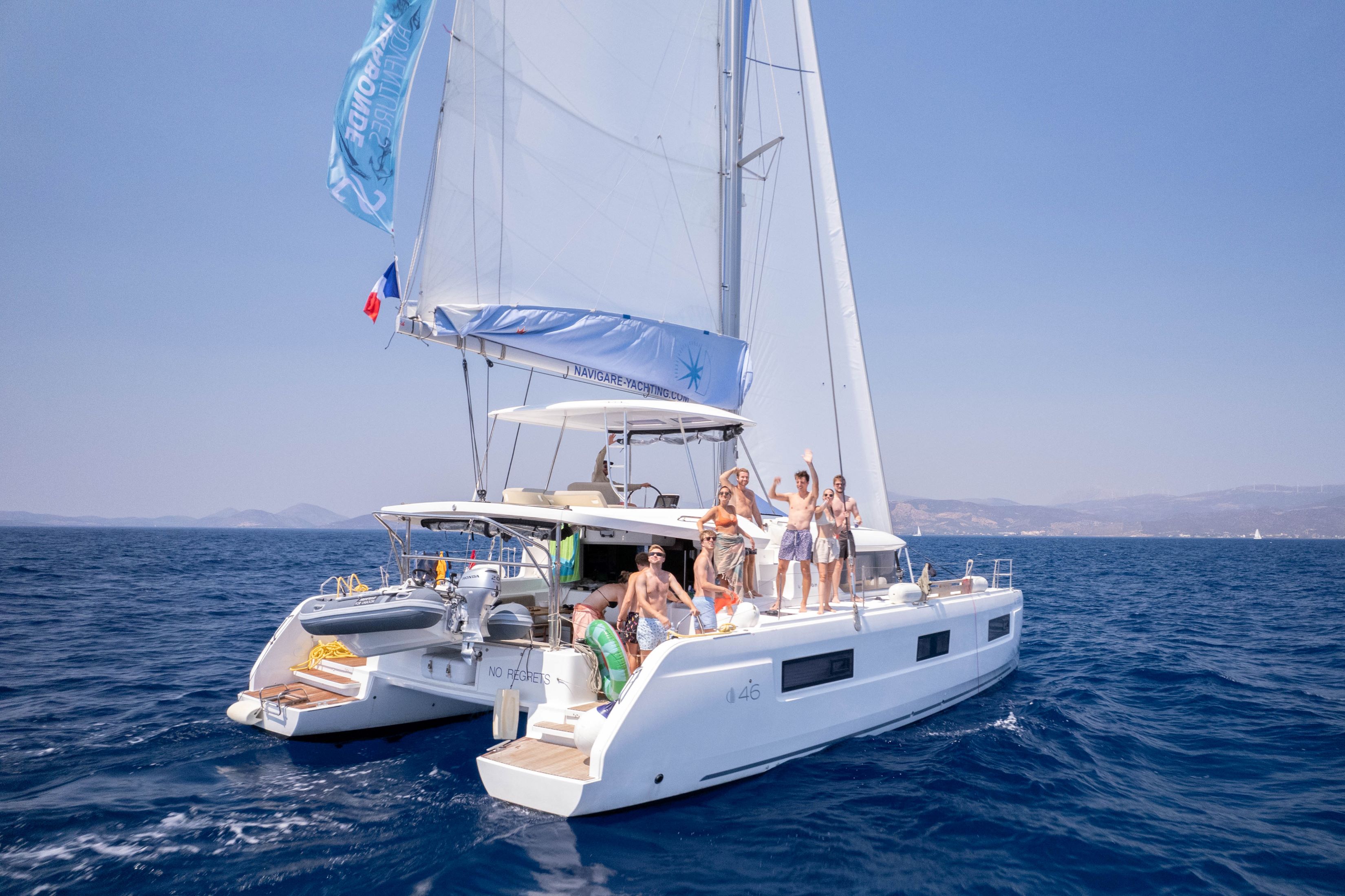 navigare-yachting-people-having-fun-on-a-catamaran.jpg